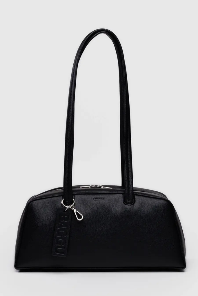 Black handbag with a visible brand logo on a light gray background