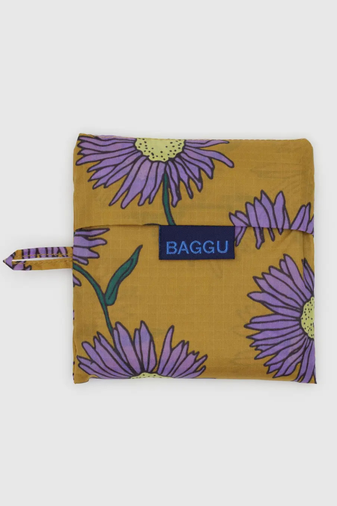 Floral-patterned reusable bag with 'BAGGU' branding on a white background