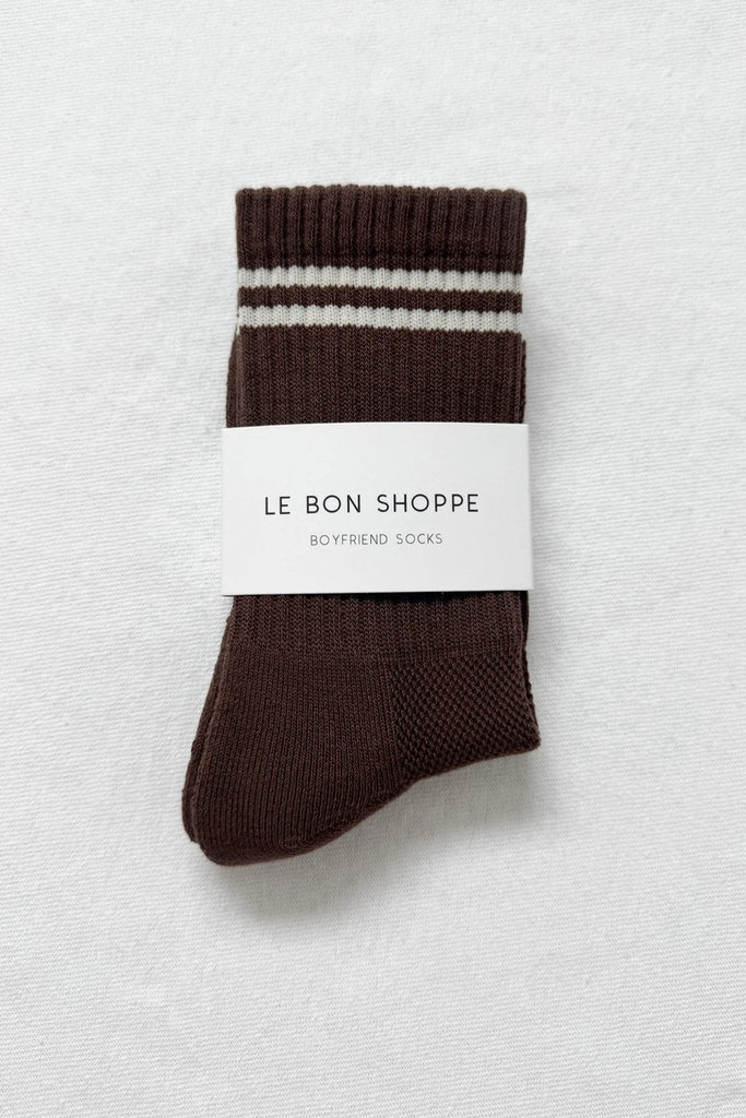 Brown sock with white stripes on a white background, labeled 'Le Bon Shoppe'.