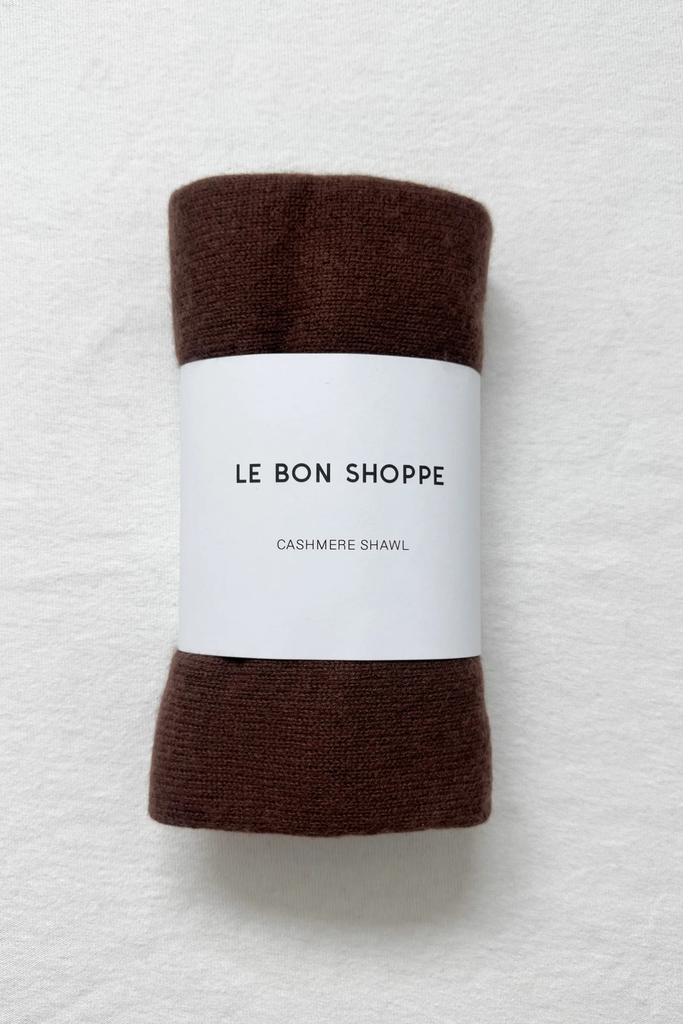 Brown cashmere shawl with 'Le Bon Shoppe' label on a textured white background