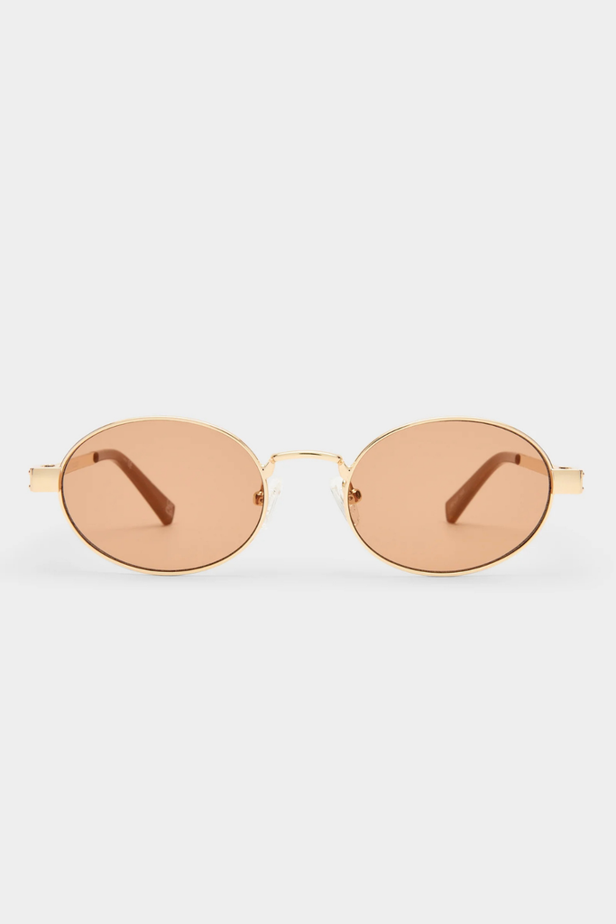 Round sunglasses with gold frame and rose gold lenses on a white background